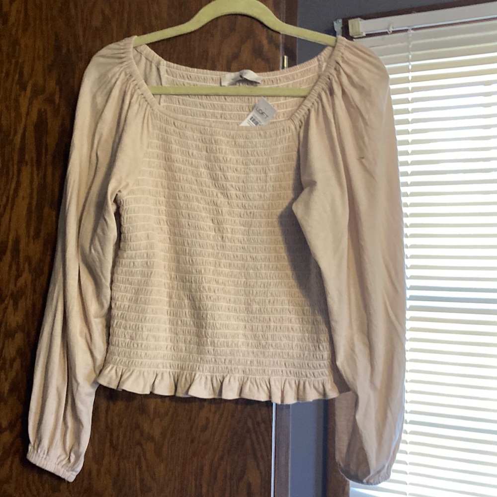 Cream blouse with frill bottom and balloon sleeves